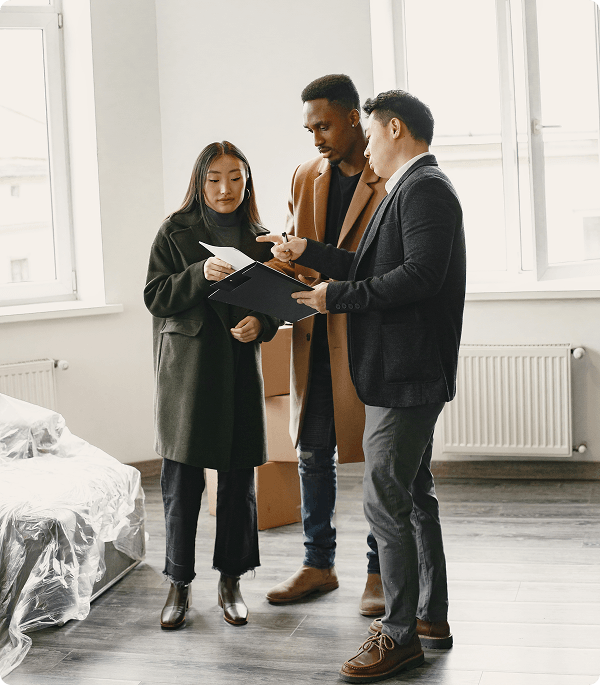 Homeowners discussing financing documents with a support specialist